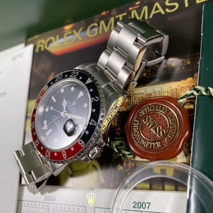 Rolex GMT Master II 16710 Coke (2006-D) - Swiss Watch Trader 