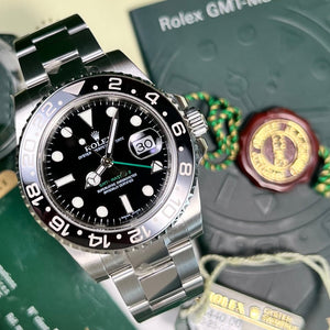 Rolex GMT Master II 116710LN (NOS) - Swiss Watch Trader