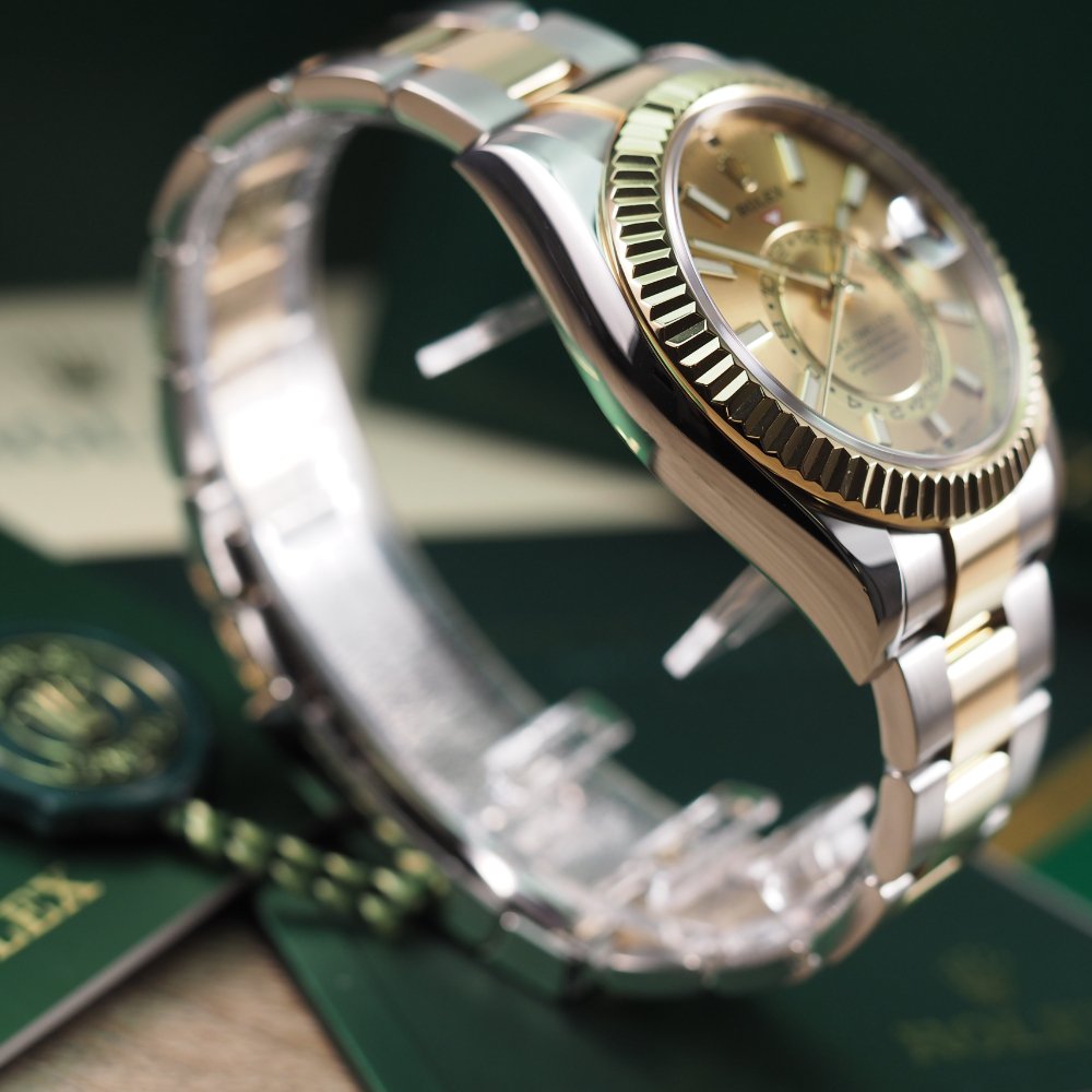 Rolex sky dweller gold champagne online dial