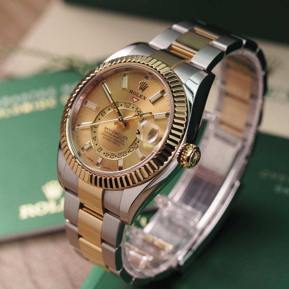 Rolex sky dweller discount gold champagne dial