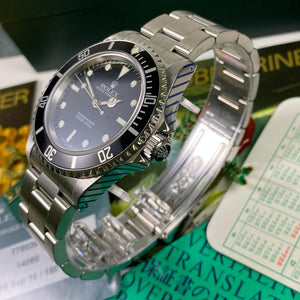 Rolex Submariner 14060 (1996-T) - Swiss Watch Trader 